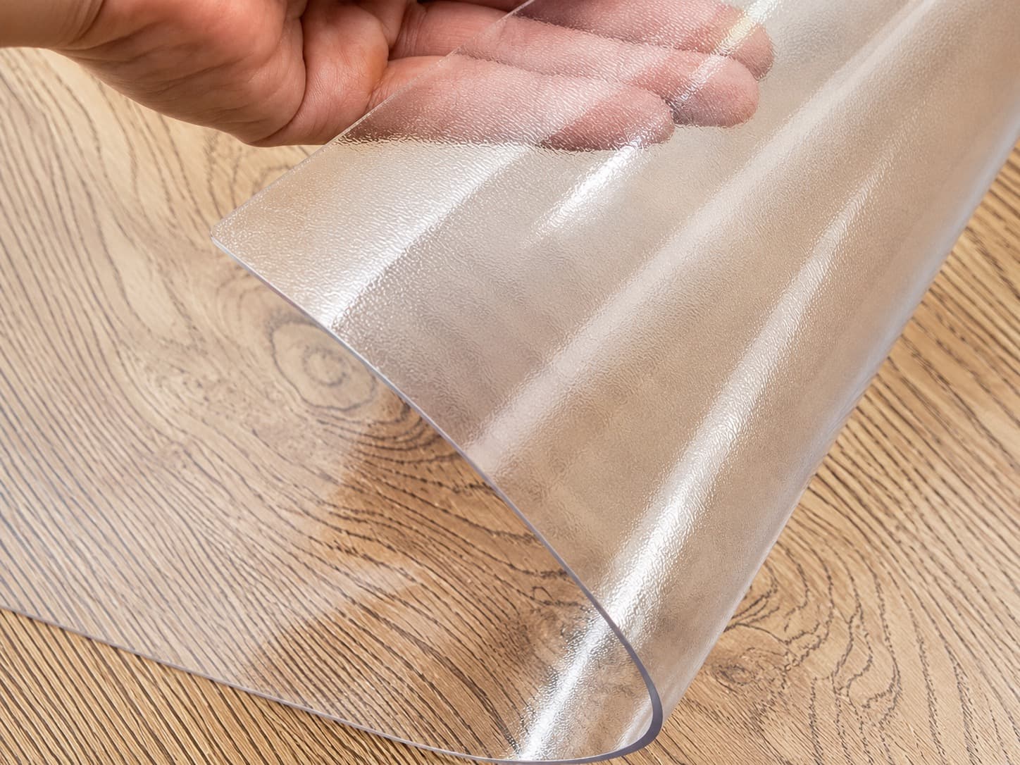 Transparent flexible glass table protector